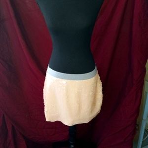 BCBGMAXAZRIA size medium sequin skirt peach or salmon colored